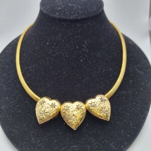Vintage 3 Hearts w/Rhinestone Stars on a Snake Chain/goldtone, GC.